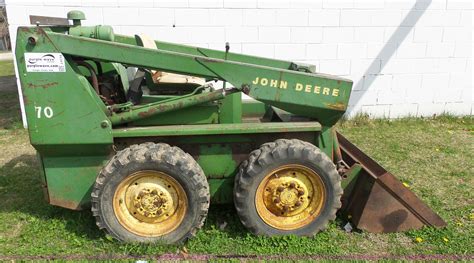 deere 70 skid steer dump height|john deere skid steer loader weight.